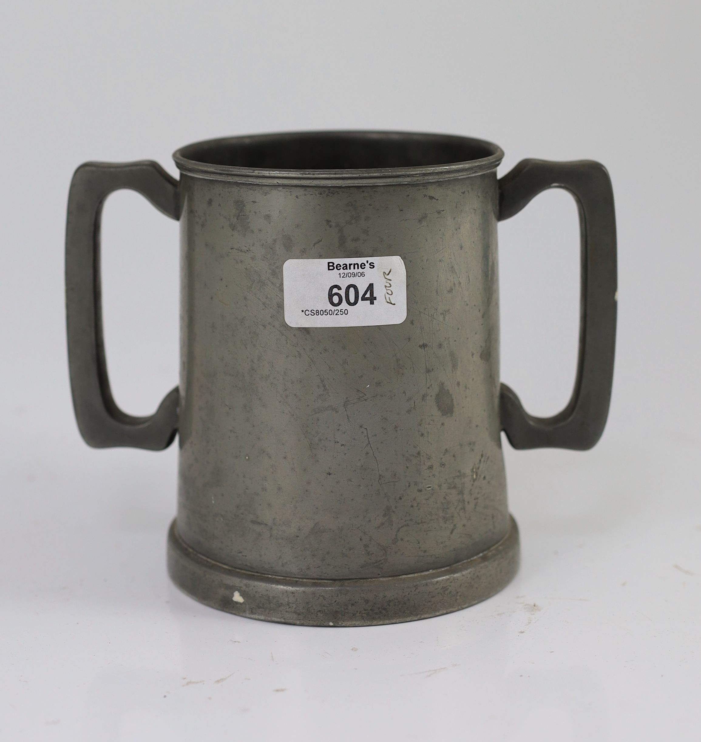 A Victorian pewter two handled presentation mug 'Exeter College Regatta, 1880'